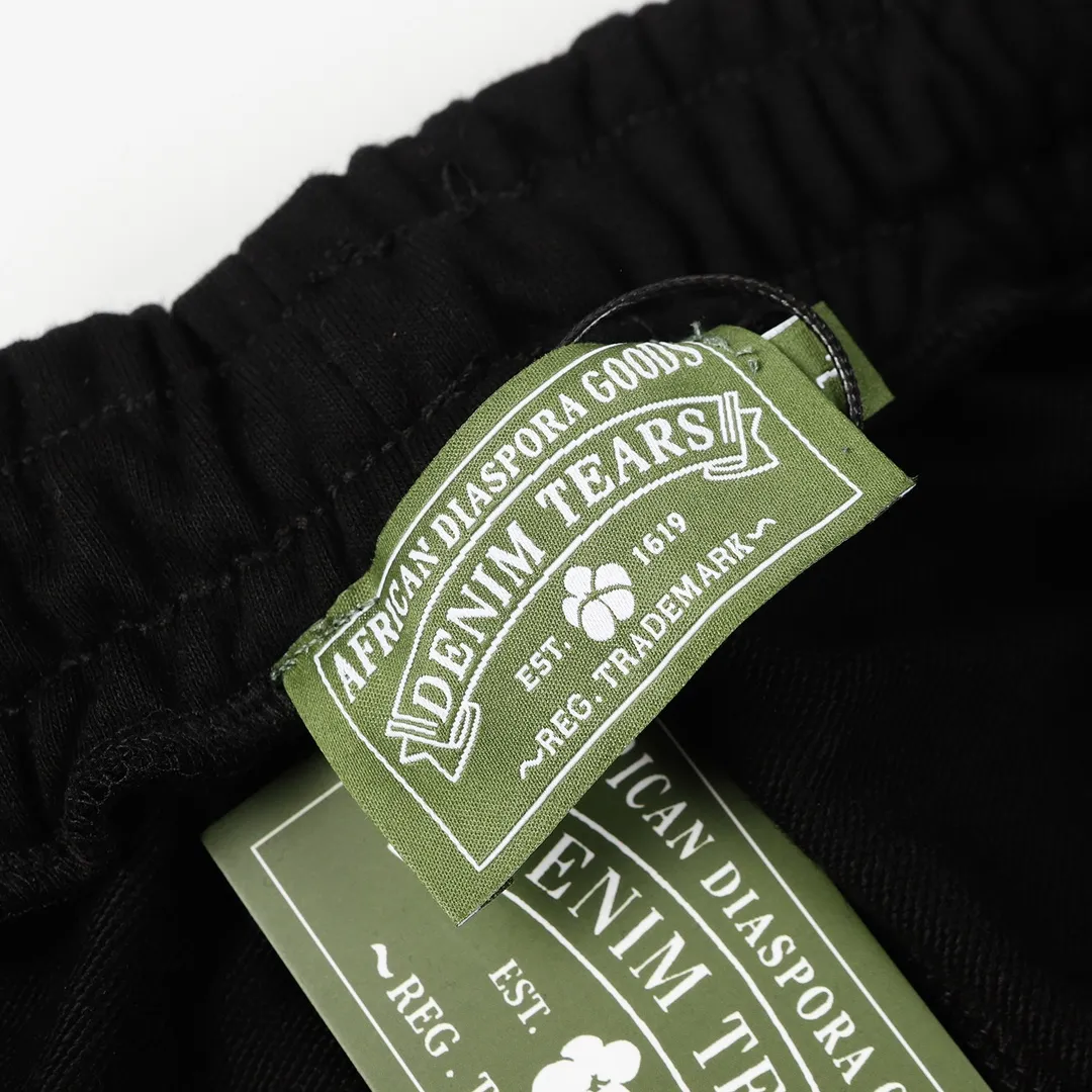 DENIM TEARS new kapok trousers model number: D240P170 color: black gray red dark gray green code number: S M L XL